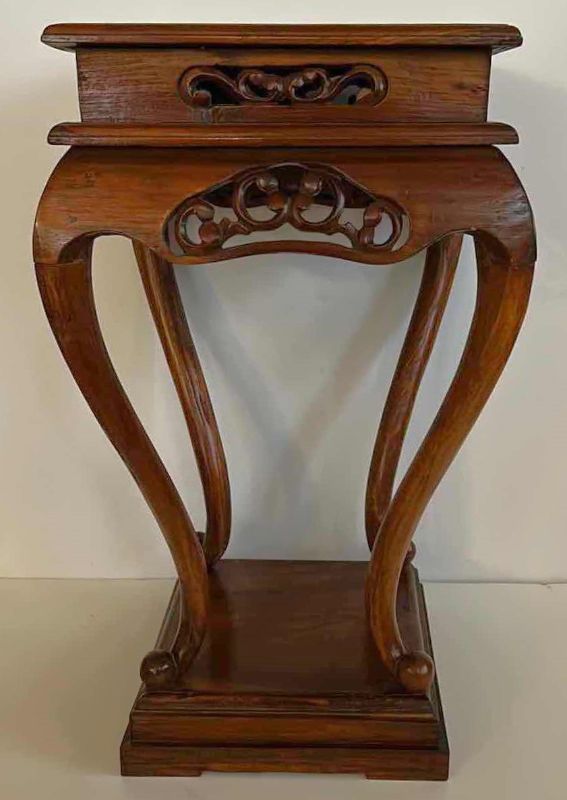 Photo 1 of CARVED WOOD PEDESTAL TABLE 15” x 24”