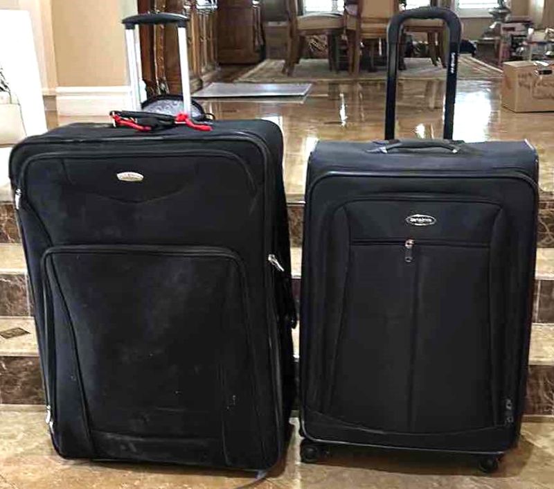 Photo 1 of 2 OVERSIZED SUITCASES