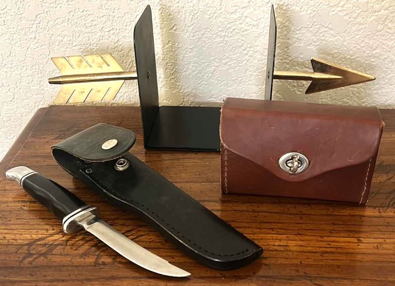 Photo 1 of VINTAGE COLLECTIBLES - BUCK KNIFE WITH LEATHER SHEATH, HONING TOOLS AND BOOKENDS