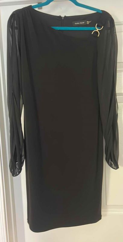 Photo 1 of WOMENS IVANKA TRUMP BLACK COCKTAIL DRESS WITH SHEER COLD SLEEVES AND OFFSET NECKLINE, SIZE 10
