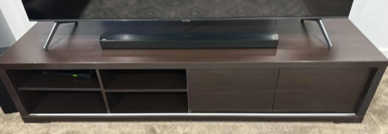 Photo 1 of SLEEK MODERN TV STAND WITH 4 PULL OUT DRAWERS AND OPEN SHELVES 83” x 22” x 18 1/4”