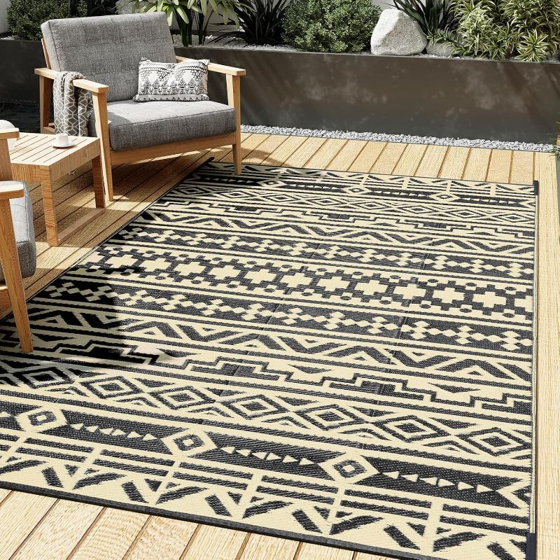 Photo 1 of  Outdoor Plastic Straw Rug, Waterproof Outdoor Rugs for Patios Clearance, Reversible Area Rug, Large Outside Carpet for Camping, Balcony, RV, Picnic, Beach 5x8ft Geometric Boho Black&Brown 