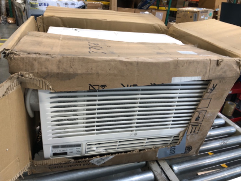 Photo 4 of ***USED***LG 11,800 BTU Through the Wall Air Conditioner and Wall Heater, 230/208V, Cools 500 Sq.Ft. (22' x 25' Room Size), Perfect for Bedroom, AC Heater Unit with Remote, Multiple Speeds, 4-Way Air Deflection