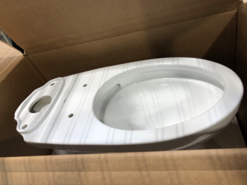 Photo 2 of *****It's just one piece**** TOTO Drake Two-Piece Elongated 1.6 GPF TORNADO FLUSH Toilet with CEFIONTECT, Cotton White - CST776CSG#01