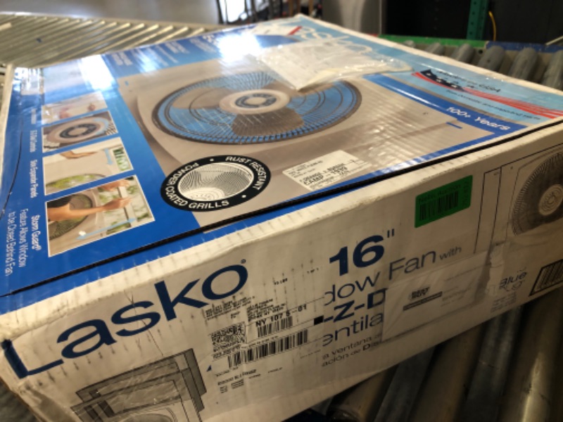 Photo 2 of ***USED**PARTS ONLY***SOLD AS IS NO RETURNS***ALL SALES ARE FINAL** *Lasko 16" Electrically Reversible Window Fan with Storm Guard, 16 INCH, White