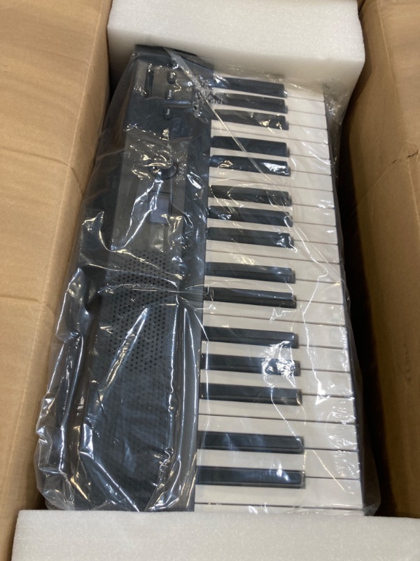 View 2 of Upgraded Folding Piano Keyboard, 88 Key Full Size Semi-Weighted Keyboard Support MIDI and Bluetooth, Portable Foldable Keyboard Piano with Sustain Pedal and Piano Bag, Best Gift for Beginner