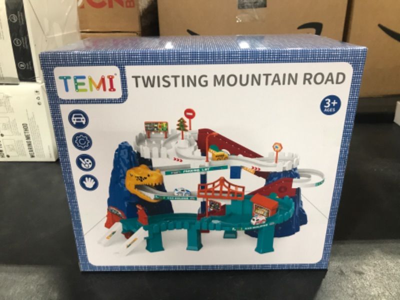 Photo 1 of TEMI Boys Race Track Car Garage Parking Adventure Toy Gifts 3 4 5 6 7 8 9 Years Old Boys Girls Toddlers, Preschool Car Games Gift Toys for Kids Vehicle Playsets (Dinosaur Track Car1232-48)