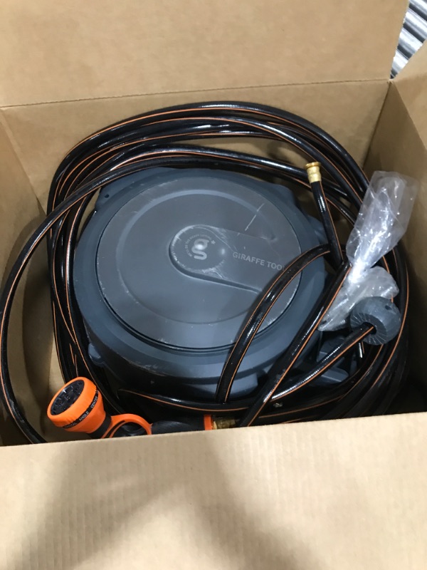 Photo 1 of Giraffe Tools Retractable Garden Hose Reel 1/2 Inch x 130 ft, Super Heavy Duty, Any Length Lock, Slow Return System, Wall Mounted and 180 Deg Swivel Bracket
