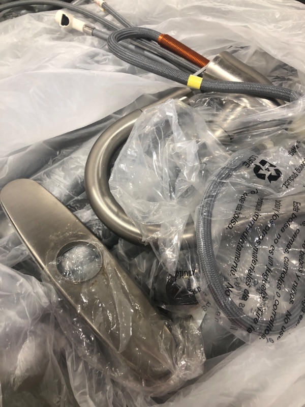 Photo 1 of Moen Riley Spot Resist Stainless One-Handle Pulldown Kitchen Faucet Featuring Power Boost and Reflex Docking System for the Spray Head, Modern Kitchen Sink Faucet, 7402SRS