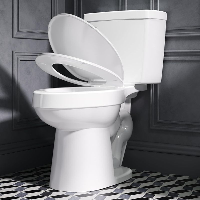 Photo 1 of ELLAI Two Piece Elongated Toilets ADA Chair Comfort Height 16.5" Powerful Single Flush 1.28 GPF 12” Rough In with Side Trip Lever, White 28.3"x17.2“x31