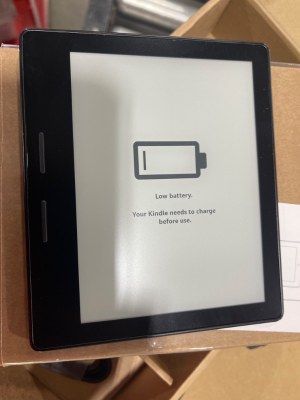 Photo 1 of Amazon Kindle Paperwhite– Now with a larger display, adjustable warm light, increased battery life, and faster page turns 
