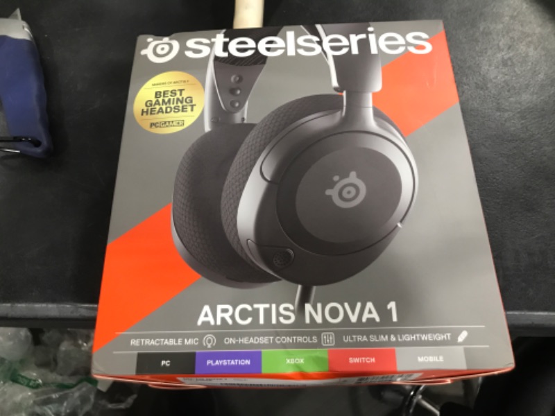 Photo 2 of NEW SteelSeries Arctis Nova 1 Multi-System Gaming Headset — Hi-Fi Drivers — 360° Spatial Audio — Comfort Design — Durable — Ultra Lightweight — Noise-Cancelling Mic — PC, PS5/PS4, Switch, Xbox - Black Black Wired Arctis Nova 1 Headset