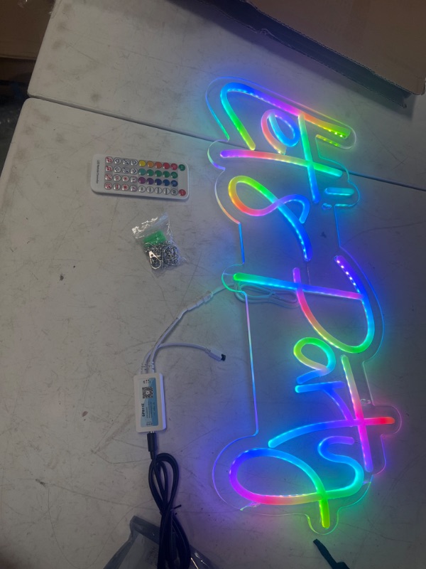 Photo 2 of    Let's Party Neon Signs Neon Light Sign for Wall Decor (Multi-colored) Comes with remote 