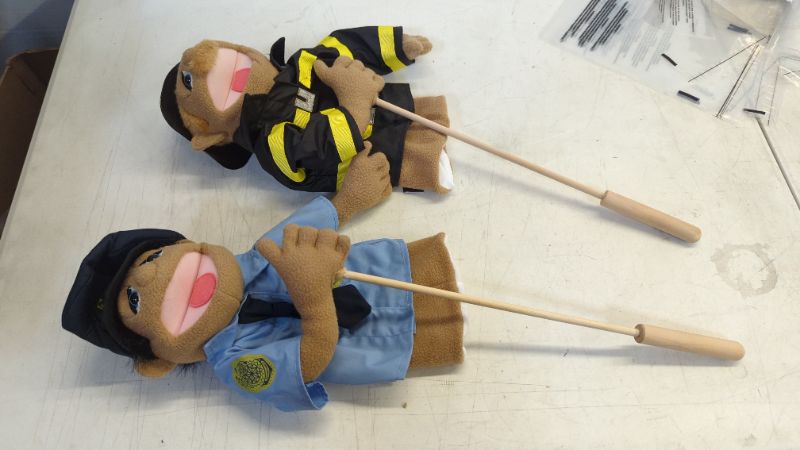 Photo 2 of Melissa & Doug Rescue Puppet Set - Police Officer and Firefighter - Soft, Plush Puppets For Kids Ages 3+
