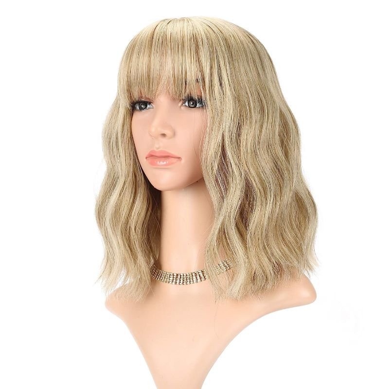 Photo 1 of FAELBATY Blonde Wig Loose Wave Short Bob Colorful Wigs With Air Bangs Shoulder Length Wig For Women Curly Wavy Synthetic Cosplay Wig for Girl Costume Wigs (12" Mix blonde and gold color)
