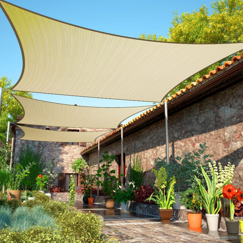 Photo 1 of ShadeMart 10' x 16' Beige Rectangle Sun Shade Sail Canopy SMTAPR1016, Water Permeable & UV Block, Heavy Duty, Easy Install & Durable for Patio Garden Backyard - We Make Custom Sizes
