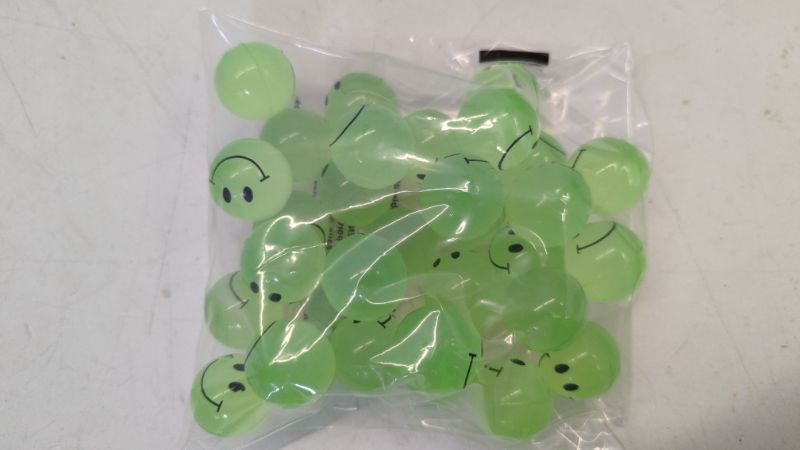 Photo 2 of Bulk Bouncy Balls Glow in The Dark - (1inch / 27mm) Diameter, High Bouncing, Small Rubber Smile Face Bouncing Balls for Kids, Vending Machines, Game Prize Toys, Party Favor, Gift Bag Filler
