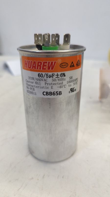 Photo 2 of HUAREW 60+5 uF ±6% 60/5 MFD 370/440 VAC CBB65 Dual Run Start Round Capacitor for Condenser Straight Cool or Heat Pump Air Conditioner or AC Motor and Fan Starting

