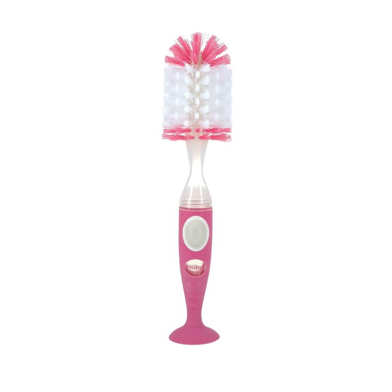 Photo 1 of Nuby Easy Clean Dispensing Soft and Durable Bristle Bottle Brush with Textured Handles and Suction Base, 2 in 1 System, Pink

