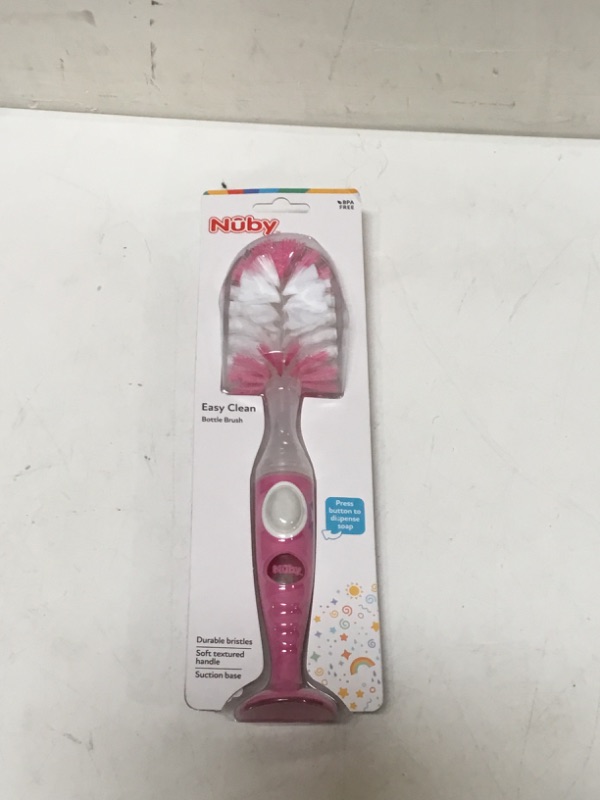 Photo 2 of Nuby Easy Clean Dispensing Soft and Durable Bristle Bottle Brush with Textured Handles and Suction Base, 2 in 1 System, Pink
