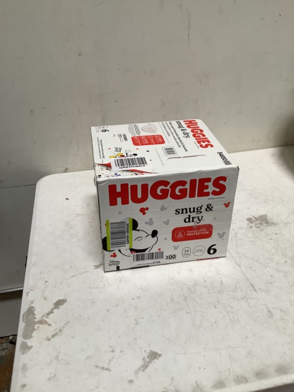 Photo 2 of Huggies Snug & Dry Baby Diapers, Size 6 (35+ lbs), 54 Ct Size 6 (54 Count)