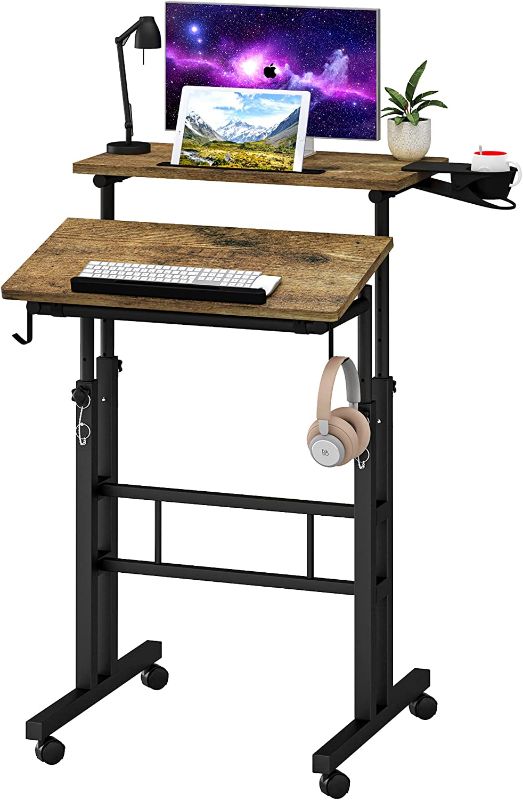 Photo 1 of Klvied Mobile Standing Desk with Cup Holder, Portable Stand Up Desk, Adjustable Height Small Standing Desk, Rolling Desk with Wheels, Home Office Laptop Cart, Computer Desk for Standing or Sitting