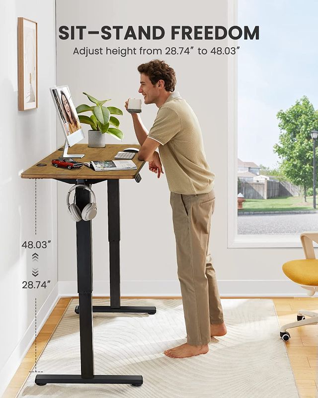 Photo 2 of ErGear Electric Standing Desk Height Adjustable Sit Stand up Desk 48 x 24 Inches Memory Computer Workstation Table with Splice Board for Home Office, Vintage Brown