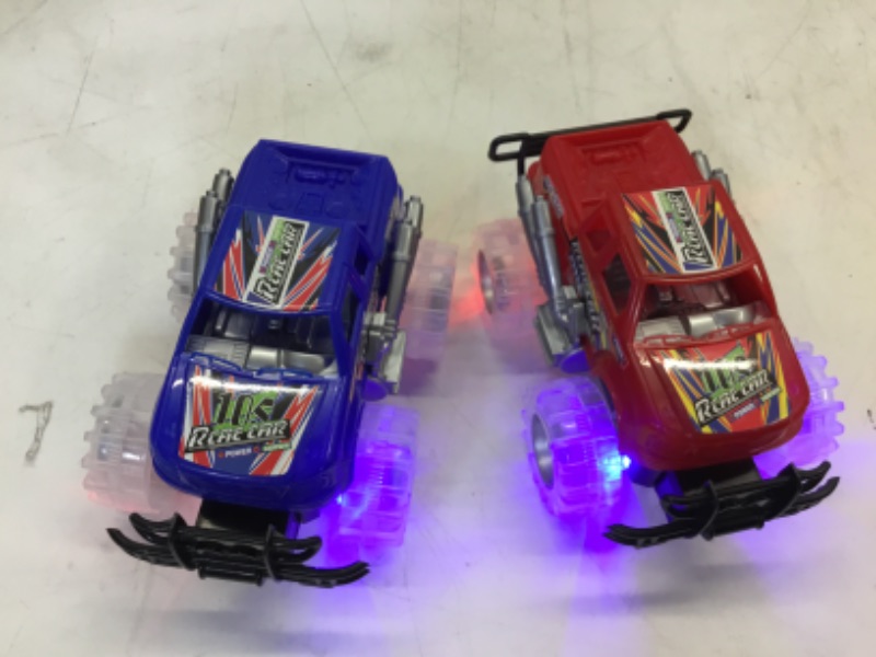 Photo 2 of ArtCreativity Light Up Monster Truck Set for Boys and Girls Set Includes 2, 6 Inch Monster Trucks with Beautiful Flashing LED Tires - Push n Go Toy Cars Fun Gift for Kids - for Ages 3+