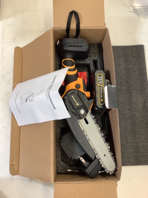 Photo 1 of Mini Chainsaw With 2 Battery, Extra Chain 