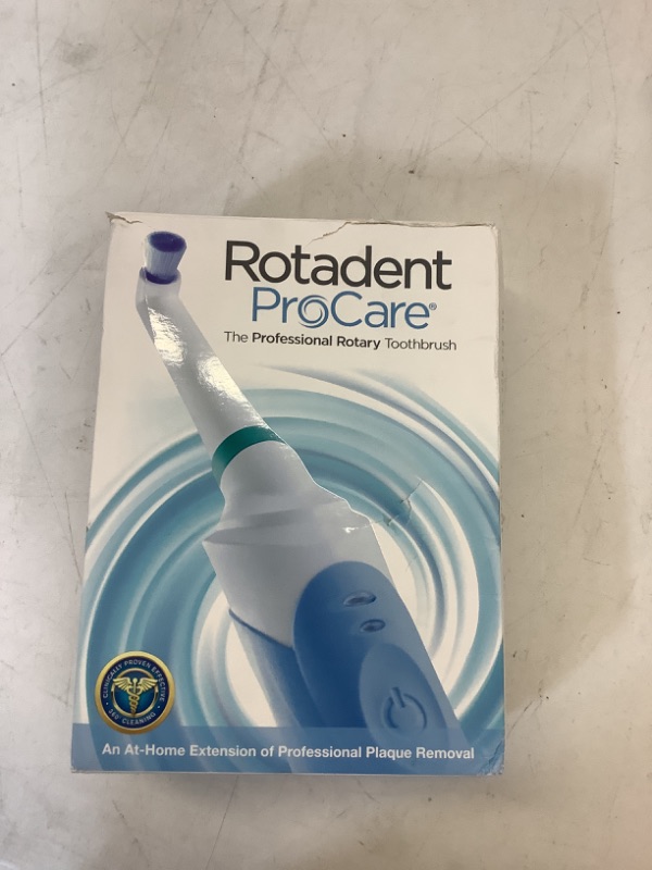 Photo 2 of ROTADENT PROCARE Professional Rotary Toothbrush with Dock Charger, 2 Brush Heads Included and 1 Year Warranty
