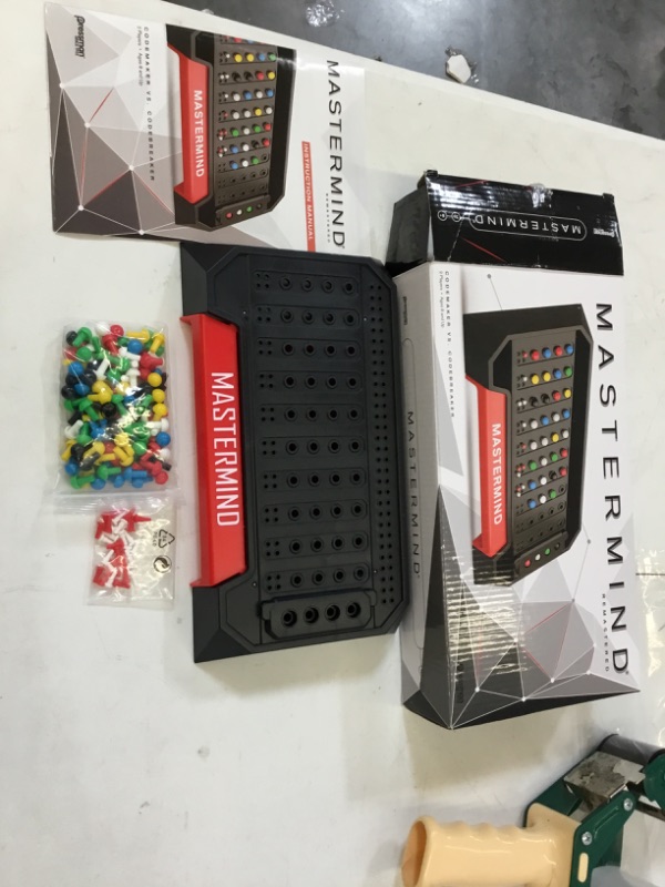 Photo 1 of Pressman Mastermind Strategy Game of Codemaker vs. Codebreaker, 5", Multi-colored