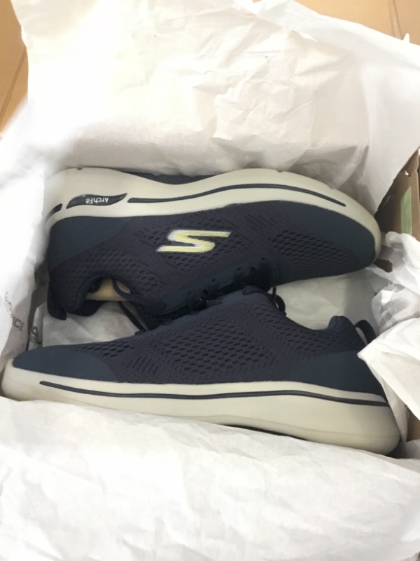 Photo 2 of Skechers Men's Gowalk Arch Fit-Athletic Workout Walking Shoe with Air Cooled Foam Sneaker 9 Navy/Gold