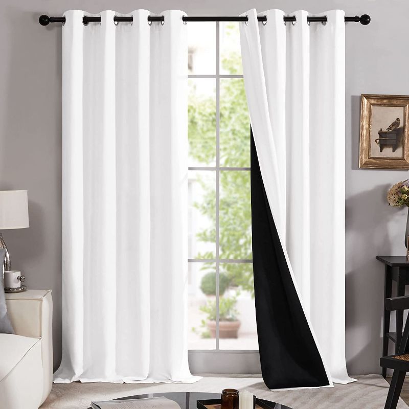 Photo 1 of Deconovo White Blackout Curtains for Bedroom and Living Room - 100% Light Blocking Window Curtains 84 Inches Long with Black Liner, Set of 2 Panels 52W x 84L Inches, Pure White