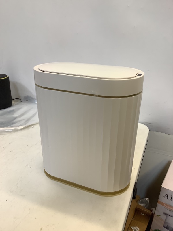 Photo 2 of ELPHECO Bathroom Trash Can with Lid Automatic Garbage Can, 2 Gallon Slim Smart Trash Can, Small Plastic Trash Bin, 10 L Narrow Motion Sensor Trash Can for Bedroom, Bathroom, Kitchen, Office 2 Gallon Golden