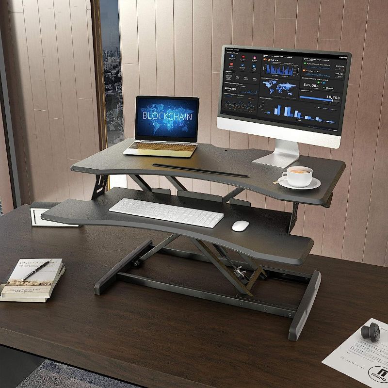 Photo 2 of FEZIBO Height Adjustable, Desk Converter Stand up Riser Tabletop Workstation fits Dual Monitor 37 inches Black