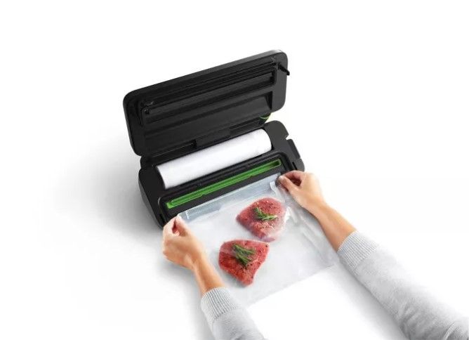 Photo 2 of FoodSaver Premier Vacuum Sealer with Dry/Moist/Marinate Modes, Roll Storage and Cutter Bar, and Bags and Roll Starter Kit - Black
