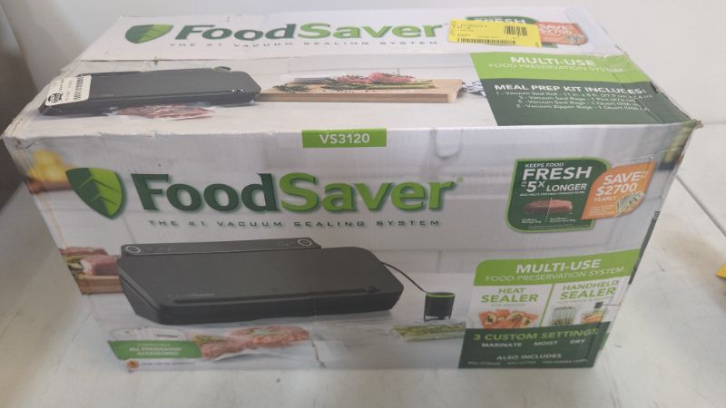 Photo 3 of FoodSaver Premier Vacuum Sealer with Dry/Moist/Marinate Modes, Roll Storage and Cutter Bar, and Bags and Roll Starter Kit - Black
