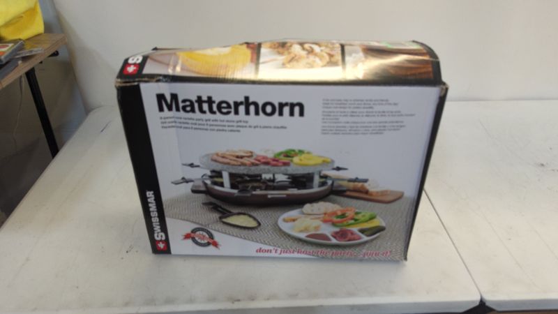 Photo 2 of Swissmar Matterhorn 8 Person Raclette (Faux Wood Base with Granite Top)
