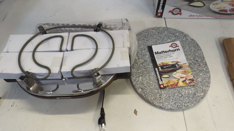 Photo 3 of Swissmar Matterhorn 8 Person Raclette (Faux Wood Base with Granite Top)
