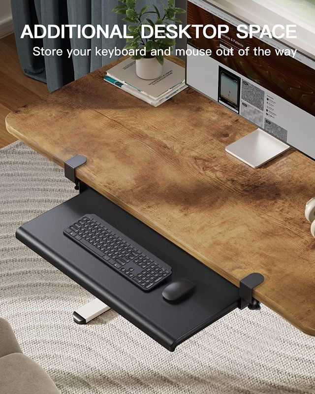 Photo 2 of HUANUO Keyboard Tray Under Desk, Ergonomic Large Keyboard Tray with C Clamp, Updated Metal Slide Rail Keyboard Tray Mouse Tray, Pull Out Platform Computer Drawer for Typing, 27.5" W x 12.2" D, Black
