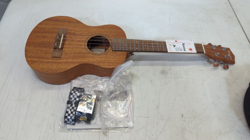 Photo 3 of Kmise Soprano Ukulele Professional Mahogany Instrument 21 Inch Hawaiian Ukalalee for Beginner With Ukelele Starter Kit ( Free Online Lesson Bag Tuner Strap Replacement Strings Instruction Booklet )
