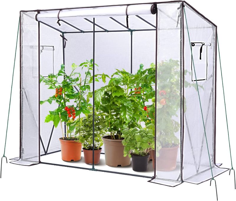 Photo 1 of Ohuhu Tomato Greenhouse for Outdoors: Portable Green House Heavy Duty with Roll-Up Zippered Door PE Cover, Tall Plastic Greenhouses for Outside Small Winter Plants Shed for Backyard, 6.6x2.5x5.6 FT
