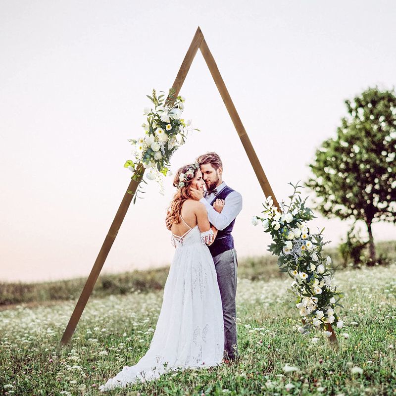 Photo 1 of Wooden Wedding Arch 10.2FT, Wood Arch for Wedding Ceremony Gorgeous Wedding Arbor Wedding Backdrop Stand for Garden Wedding Parties, Wooden Arch Decor Rustic Wedding Arch Decorations
