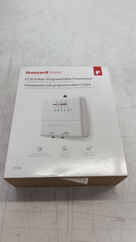 Photo 2 of Honeywell Home CT31A1003 Heat/Cool Non-Programmable Thermostat, Beige
