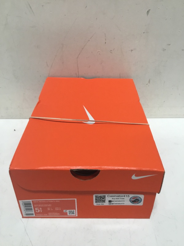Photo 1 of Nike Unisex-Child Revolution 5 Grade School Running Shoe Smoke Grey/Dark Smoke Grey-photon Dust-metallic Copper-gum Medium Brown 5.5Y Youth US Big Kid