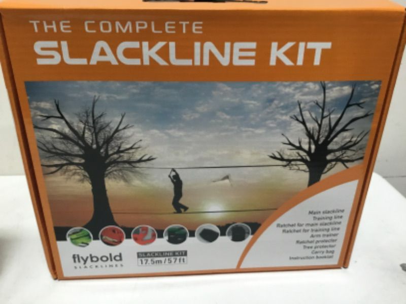 Photo 2 of flybold Slackline Kit with Training Line - 57 ft Kids Backyard Slack Line Equipment - Balance Rope w/Tree Protectors, Arm Trainer, Ratchet Cover & Carry Bag - 57 ft Tight Rope for Kids and Adults COMPLETE KIT