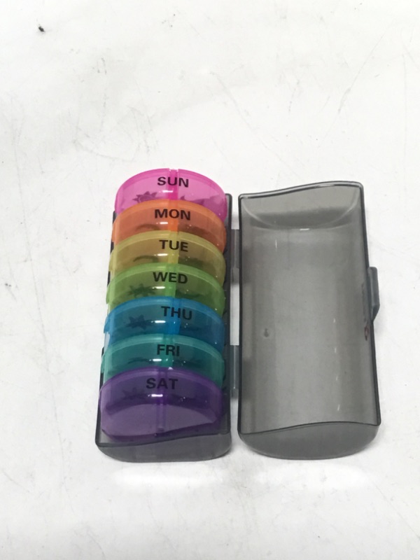 Photo 1 of Weekly Pill Organizer 7 Day 2 Times a Day, Portable Travel Pill Organizer, Detachable AM/PM Pill Box, Easy to Carry Pill Case, for Vitamin/Pill/Fish Oil/Supplements(Round)
