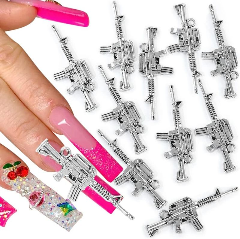 Photo 1 of 2 Pack Dornail 10pcs 3D Gun Nail Charms Alloy Submachine Gun Charms for Nails Retro Silver Gun Nail Art Charms Metal Weapon Charms for Jewelry Making DIY Nail Art Decoration Nail Accessories