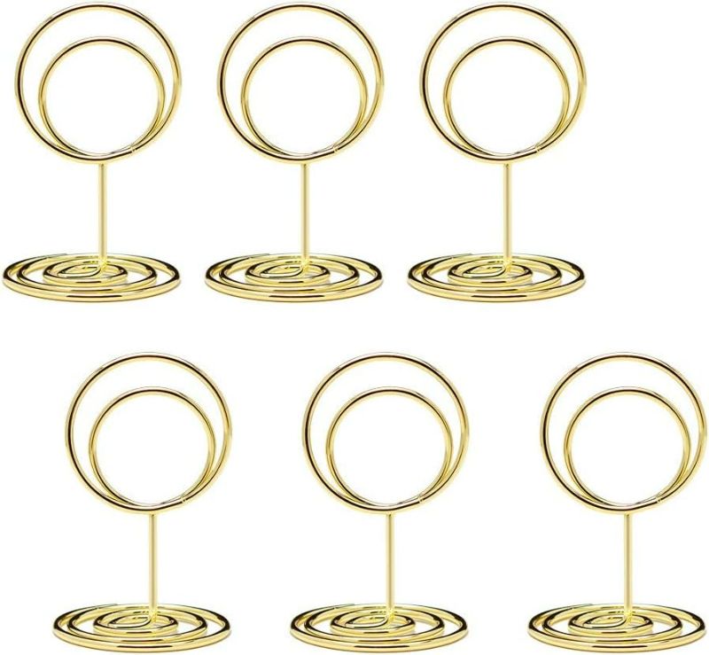 Photo 1 of 26 pcs Mini Table Number Holders, Cute Place Card Holder for Weddings, Table Number Stands Picture Holders for Centerpieces, Table Card Holders Small Wire Photo Holders Menu Clips (Gold)