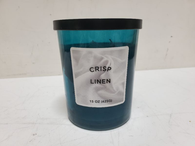 Photo 1 of CRISP LINEN SCENTED 15 OZ CANDLE 